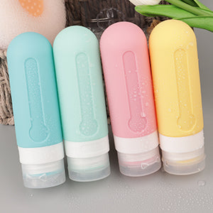 KUNFAIT Set of 4 Empty Silicone Refill Travel Bottles for Toiletries with Scrubber